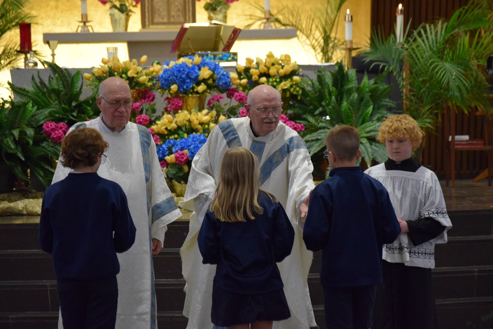 Students participating in Mass